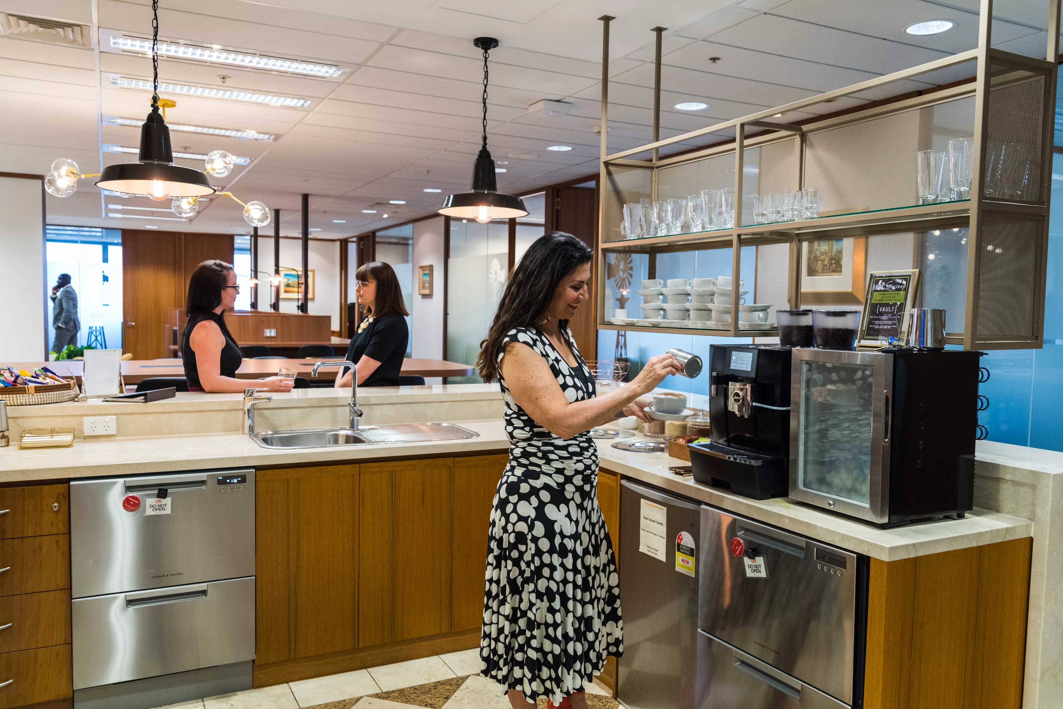 Clients enjoying the fully stocked kitchen in Servcorp 140 St Georges Terrace Perth