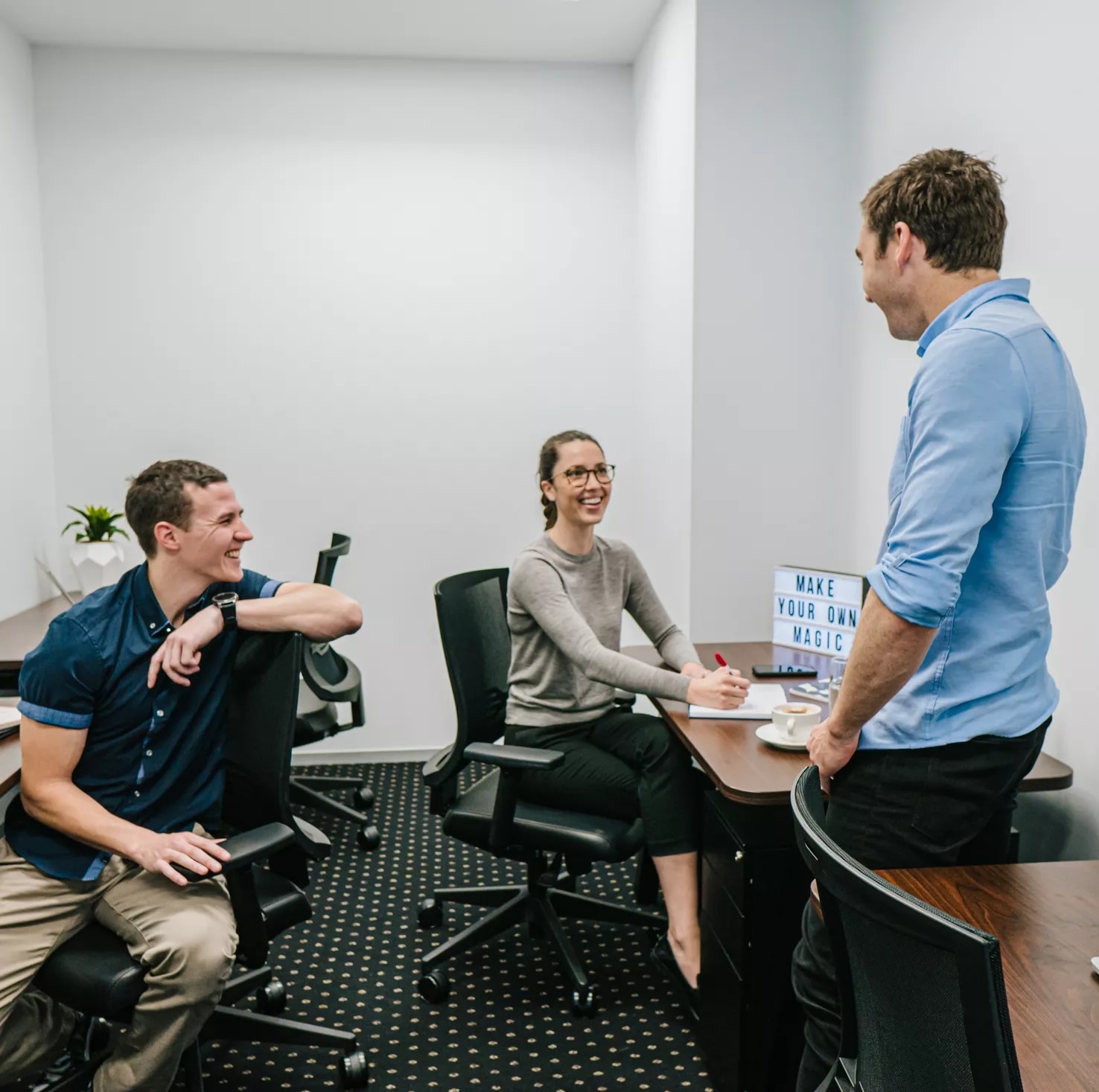 close up on people working in a service office room in Barangaroo, tower 1