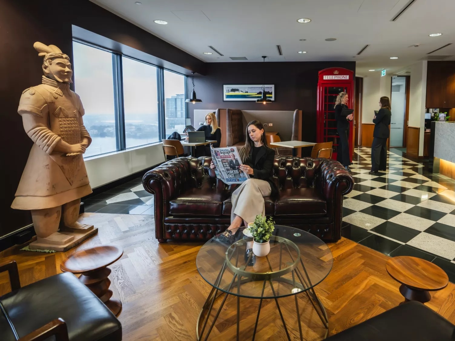 Modern coworking space in Servcorp 44 Market Street filled with clients and lounge with a great view