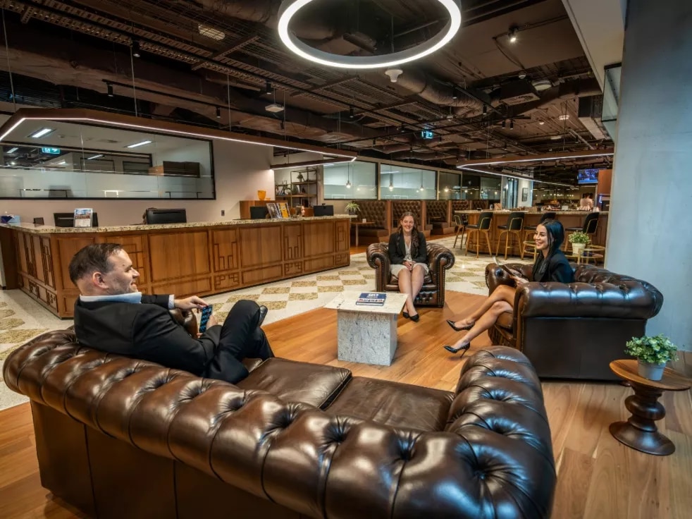 Clients conversing and enjoying the lounge in Servcorp 3 Parramatta Square